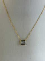 Emerald Bezel Solitaire