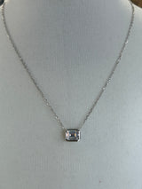 Emerald Bezel Solitaire