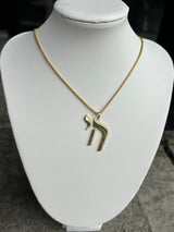 Chai Charm Necklace available in gold and silver.